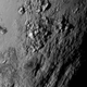 A new close-up image of a region near Pluto’s equator reveals a range of youthful mountains high above the surface of the icy body.
